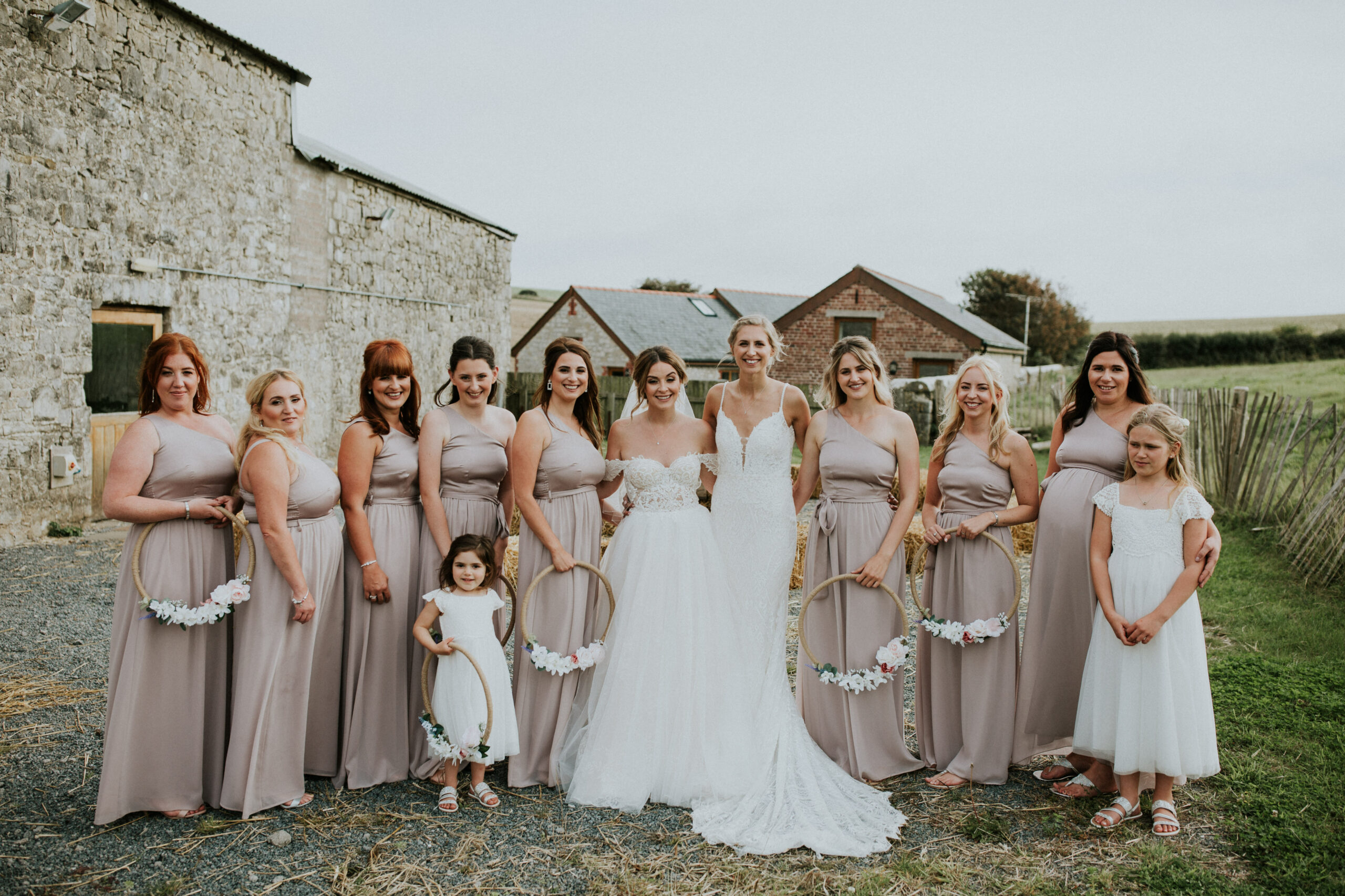 bridesmaids looking at each other and laughing 