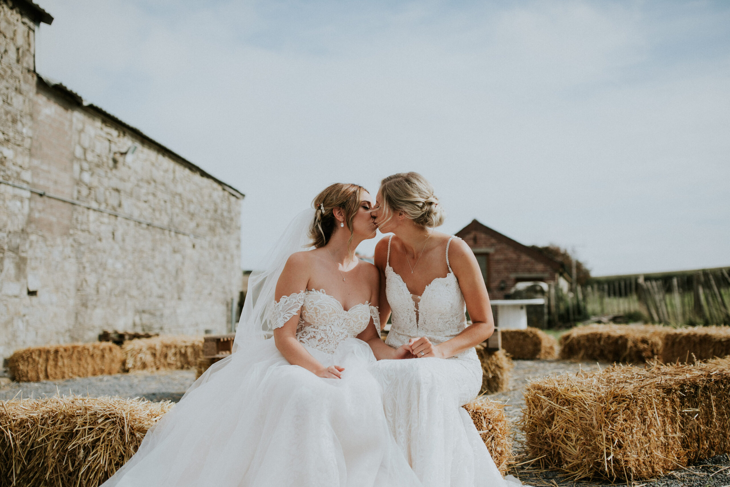 brides kissing 