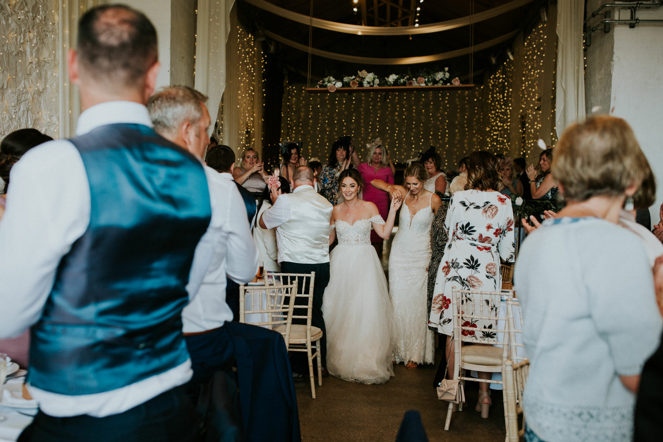 brides enter the reception 