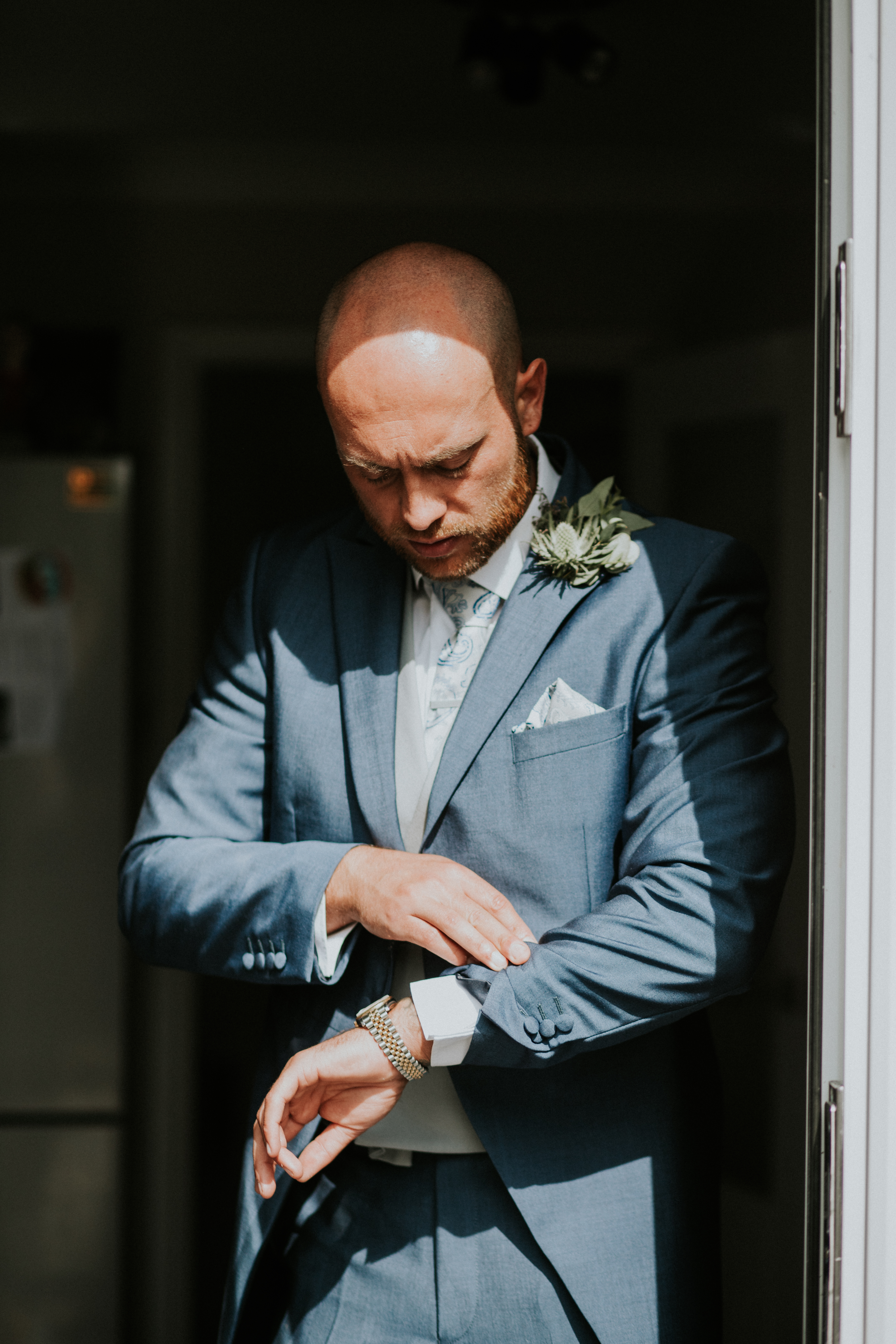 groom looking at his watch 