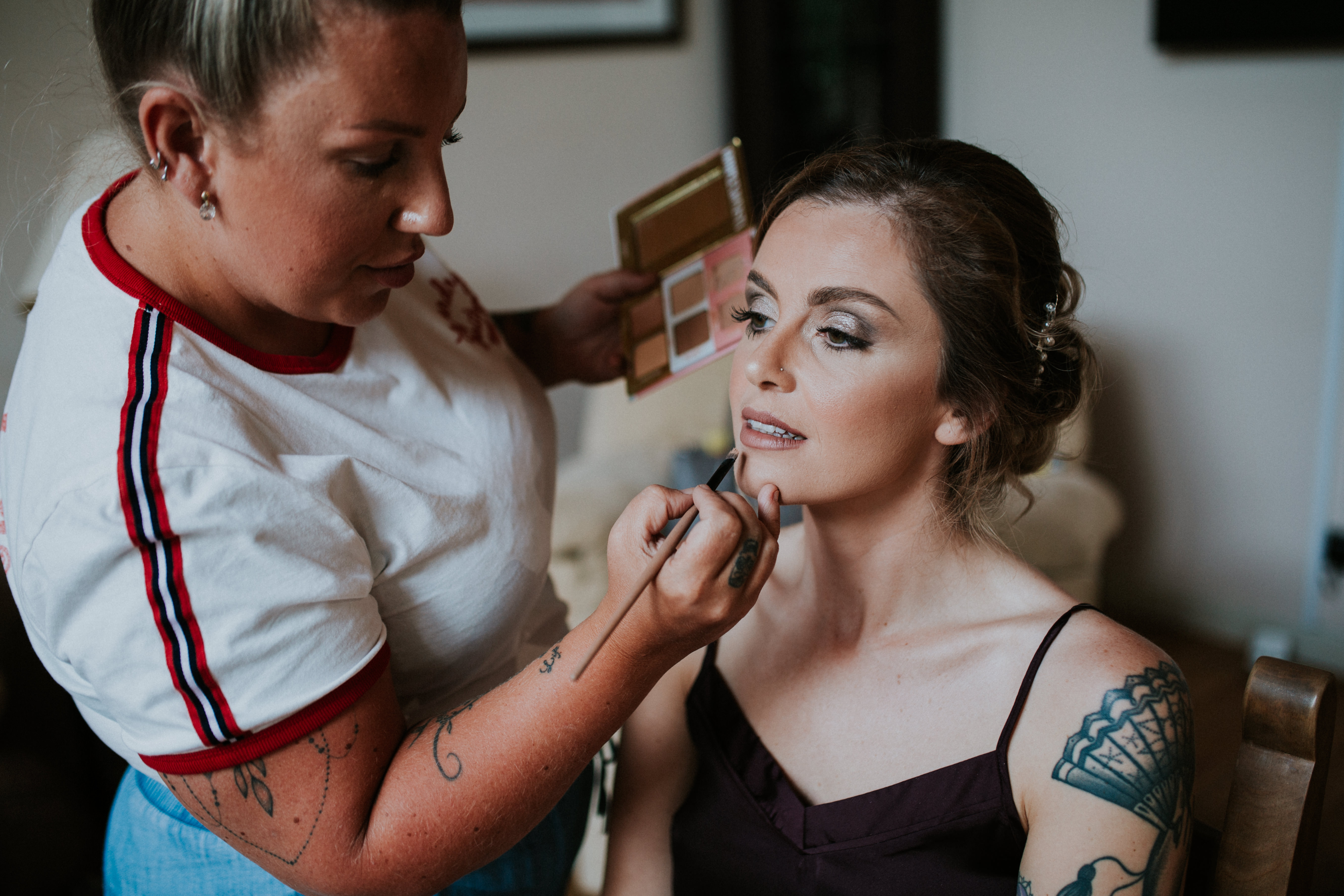 bride having make-up done