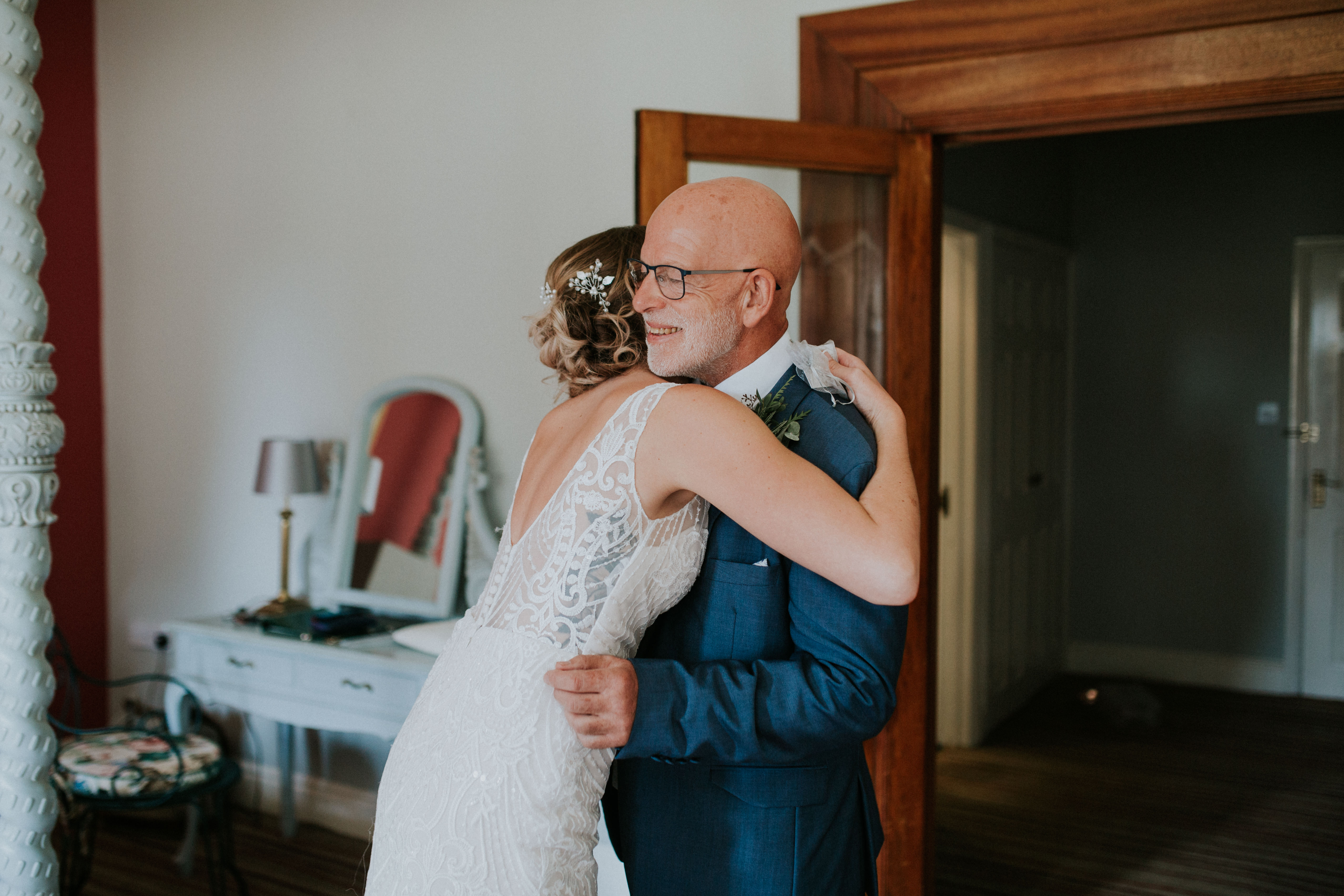 bride hugging dad