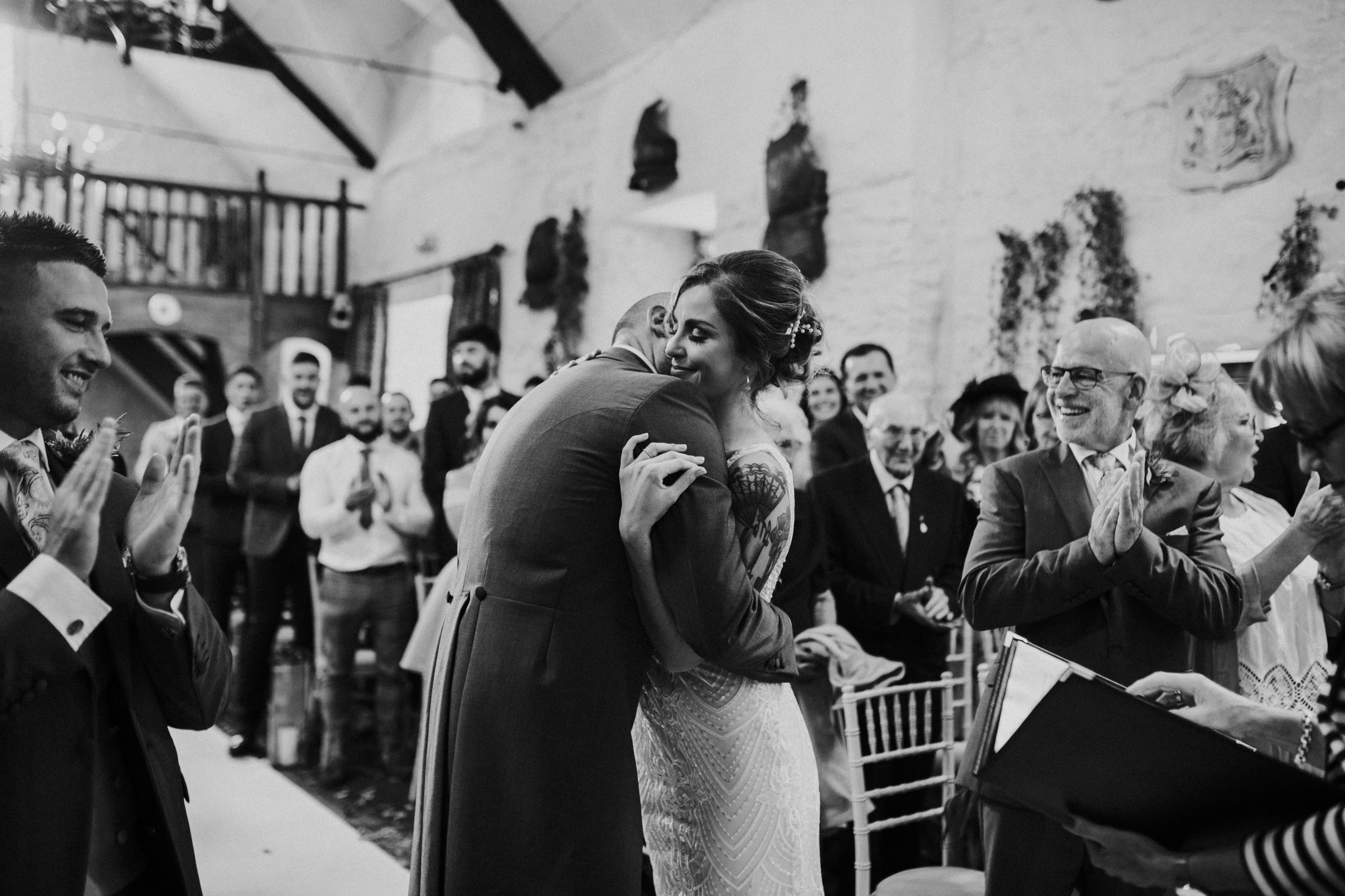 bride and groom hug 