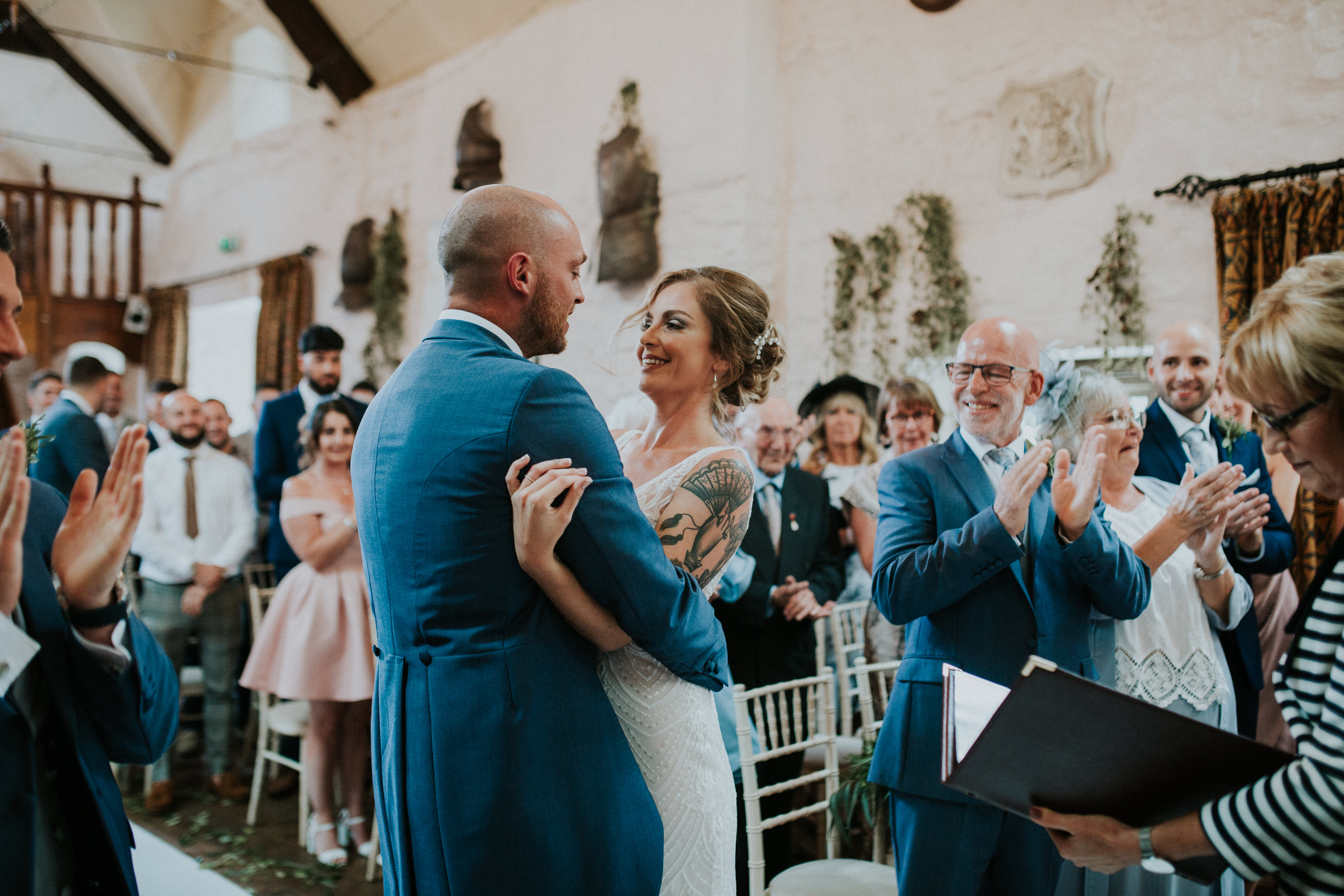 bride and groom smiling 