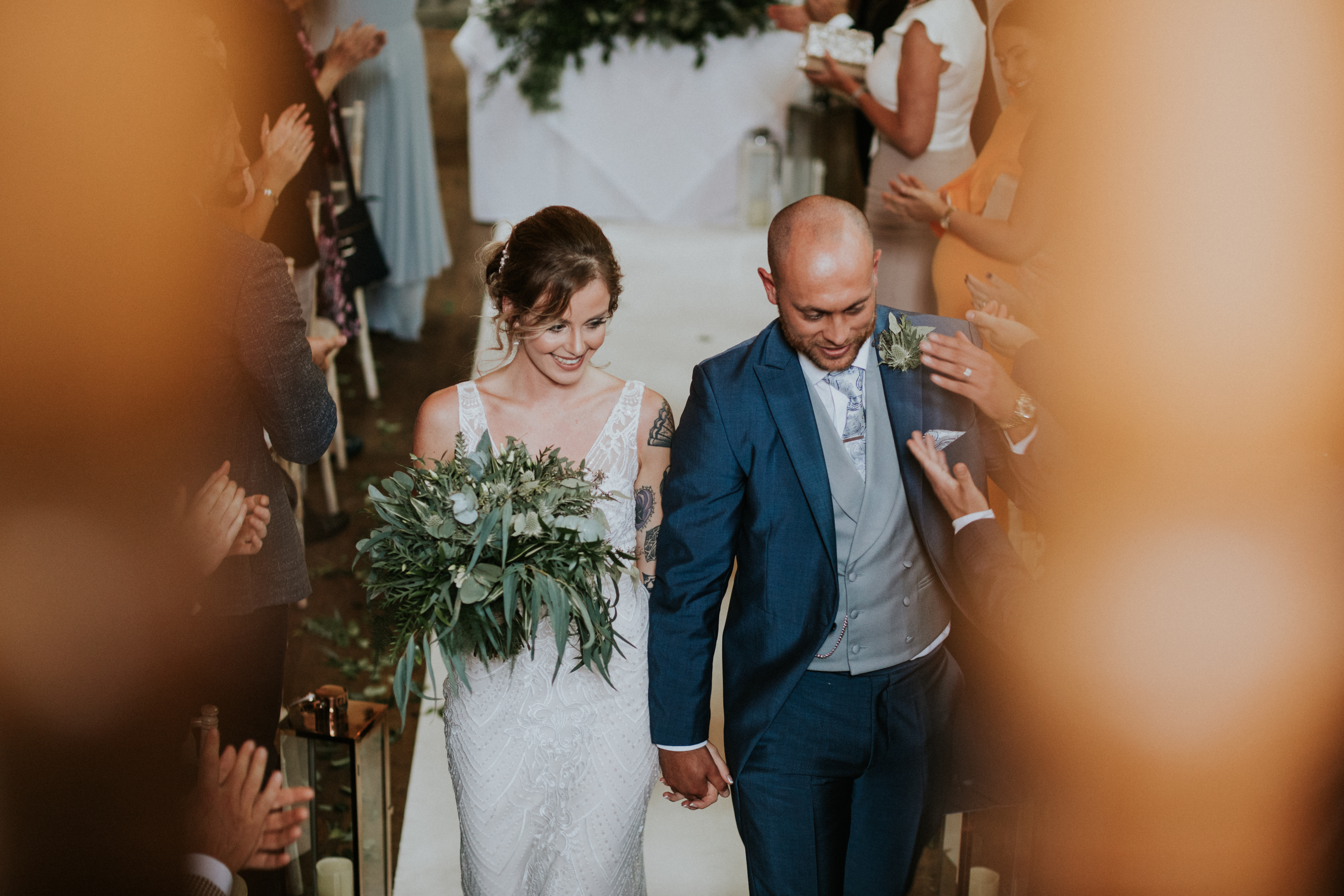 couple walking down the aisle 