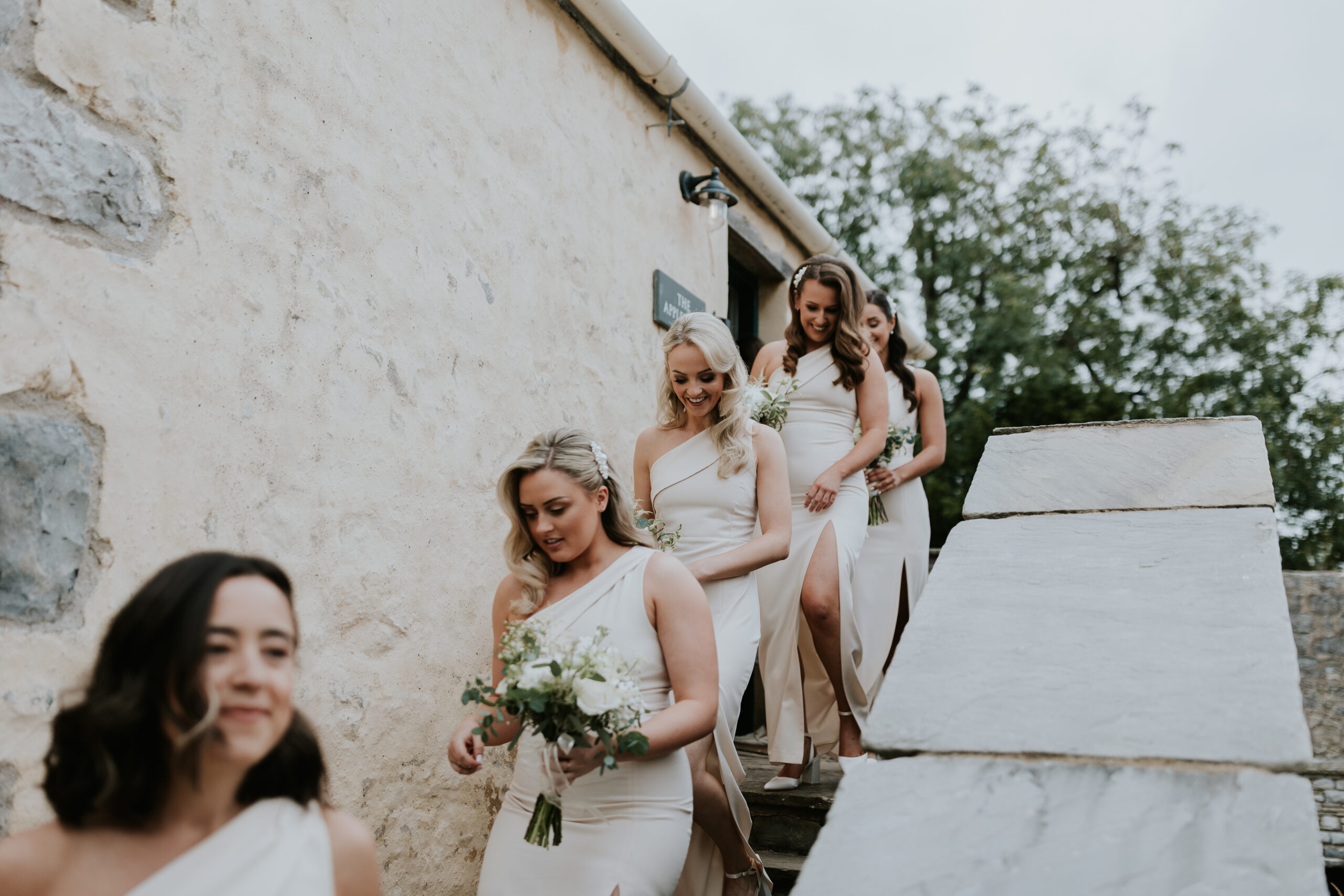 Bridesmaids walking to the ceremony 